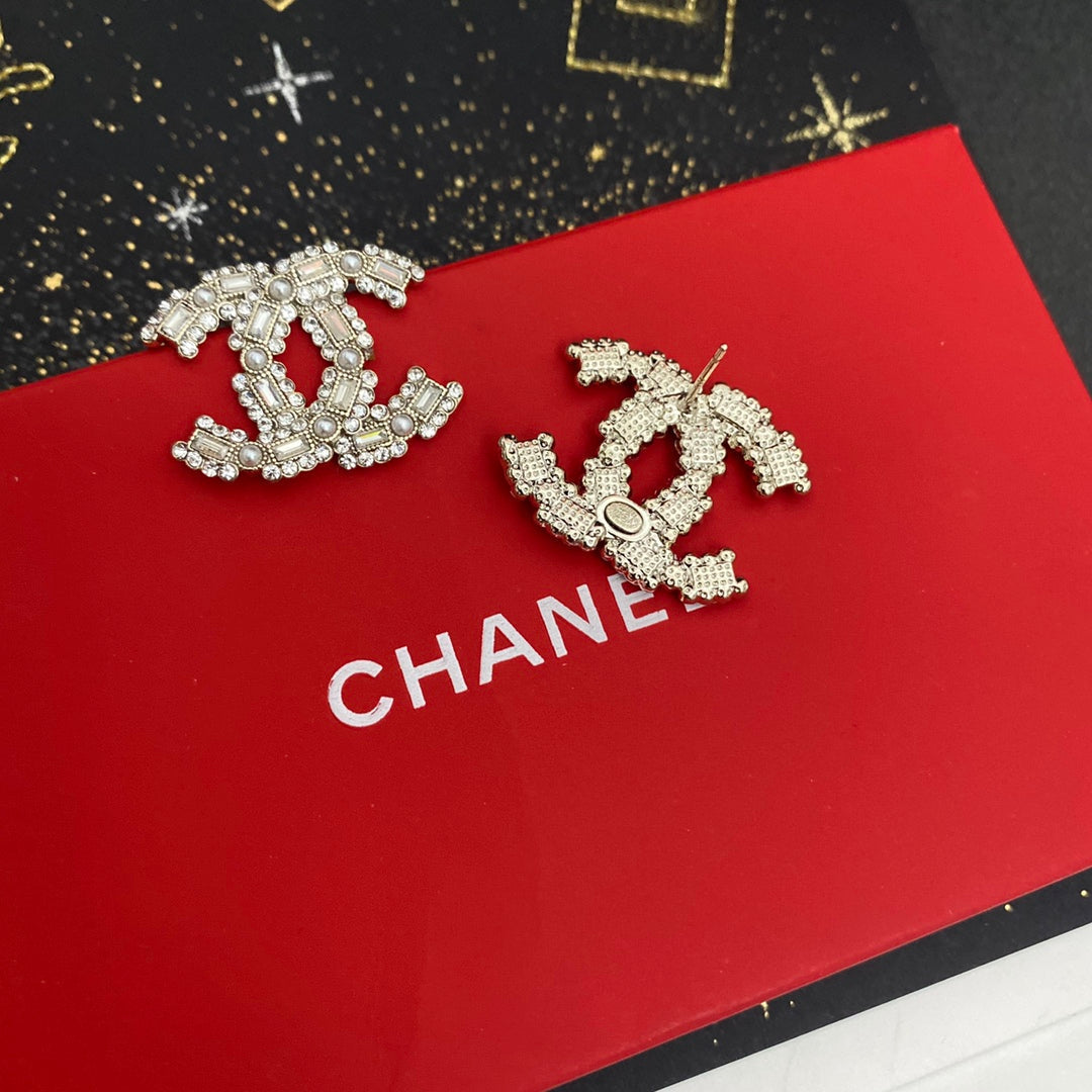 Boucles d'oreilles Logo Diamant Perle