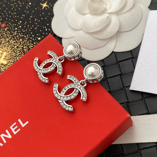 Boucles d'oreilles perles et diamants