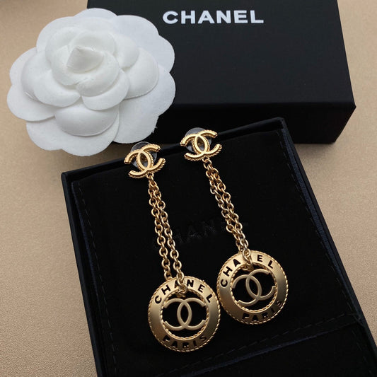 Boucles d'oreilles Double C à pompons découpés