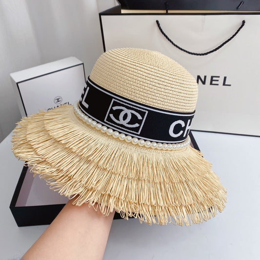 Chapeau de paille à franges et perles