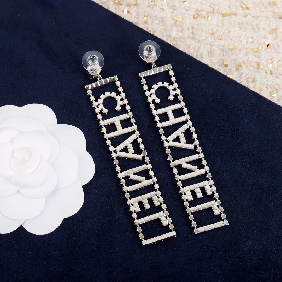 Boucles d'oreilles alphabet diamant de cristal