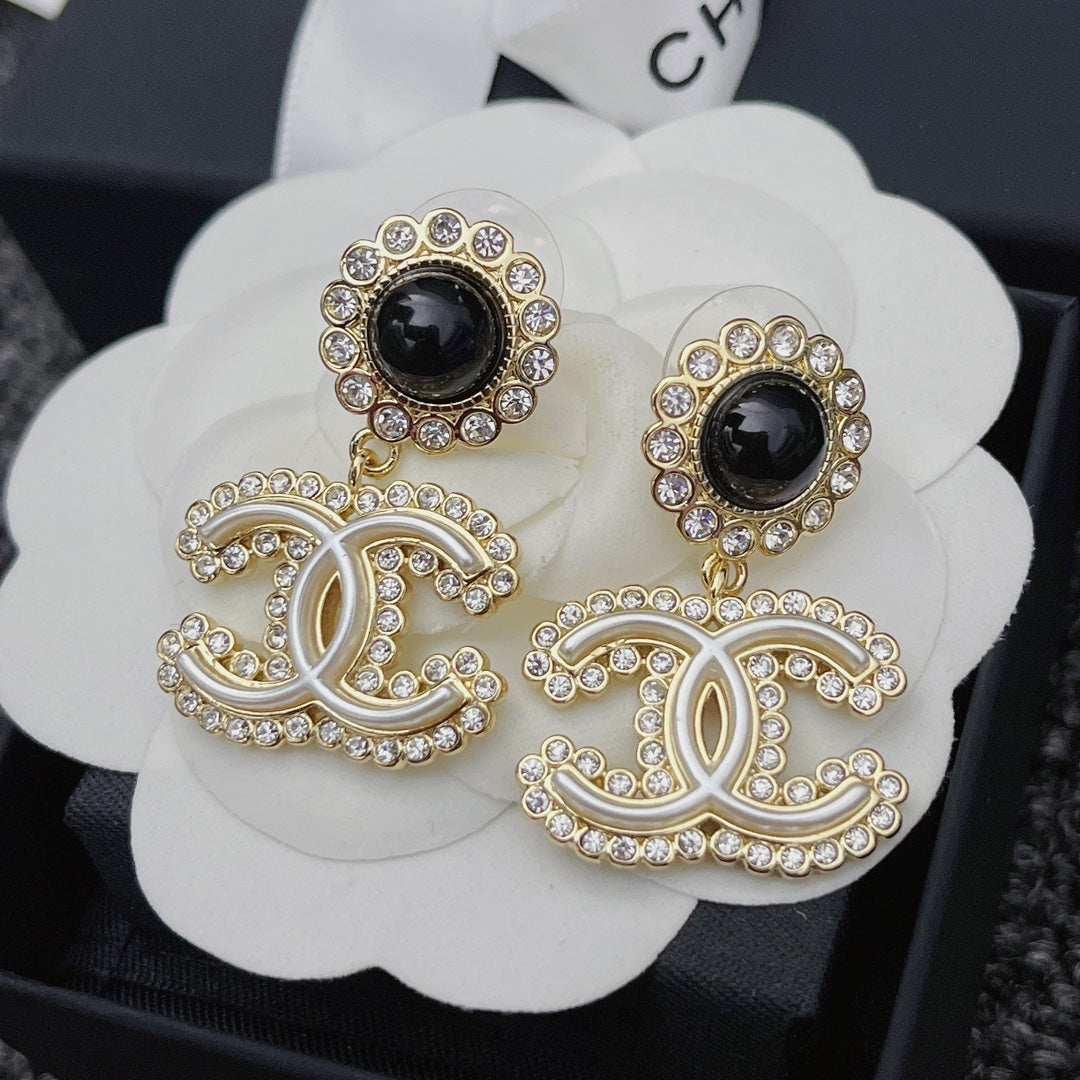 Boucles d'oreilles fleur en cristal et diamant