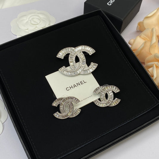 Broche et boucles d'oreilles en cristal baguette argenté