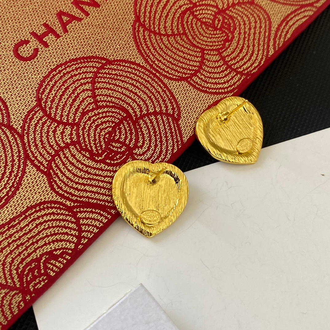 Boucles d'oreilles clous cœur à paillettes