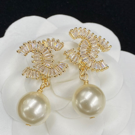Boucles d'oreilles pendantes en perles de zircon étincelantes