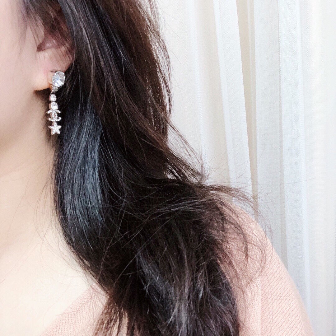 Boucles d'oreilles longues Étoile de Cristal