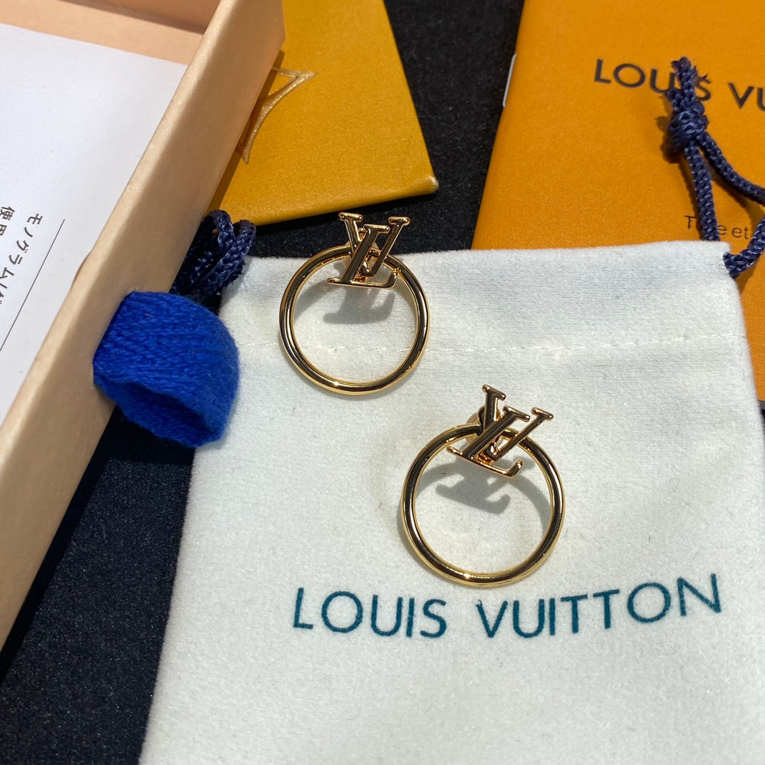 Boucles d'oreilles créoles avec logo lettre