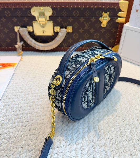 Bolso de cámara ovalado