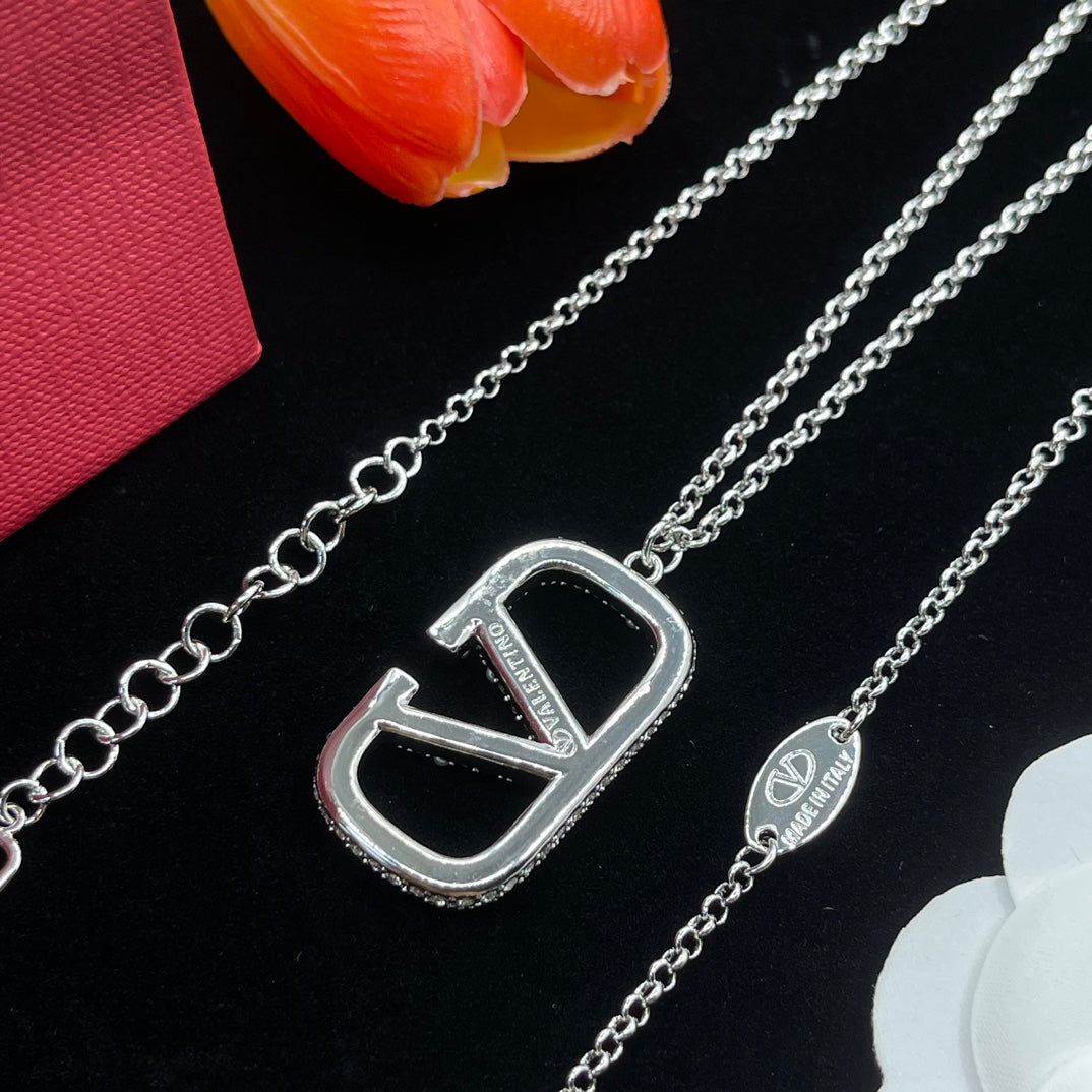 Juego de joyas con logotipo de diamante de plata vintage