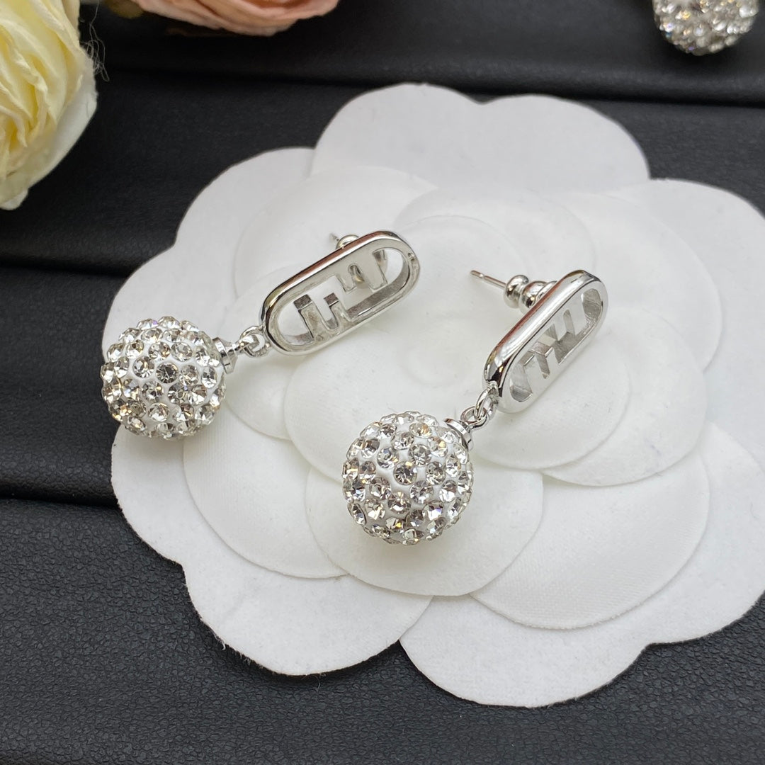 Boucles d'oreilles pendantes boule de cristal en métal