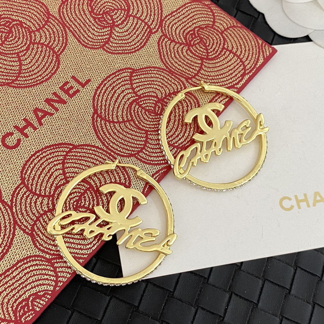 Boucles d'oreilles créoles lettres creuses
