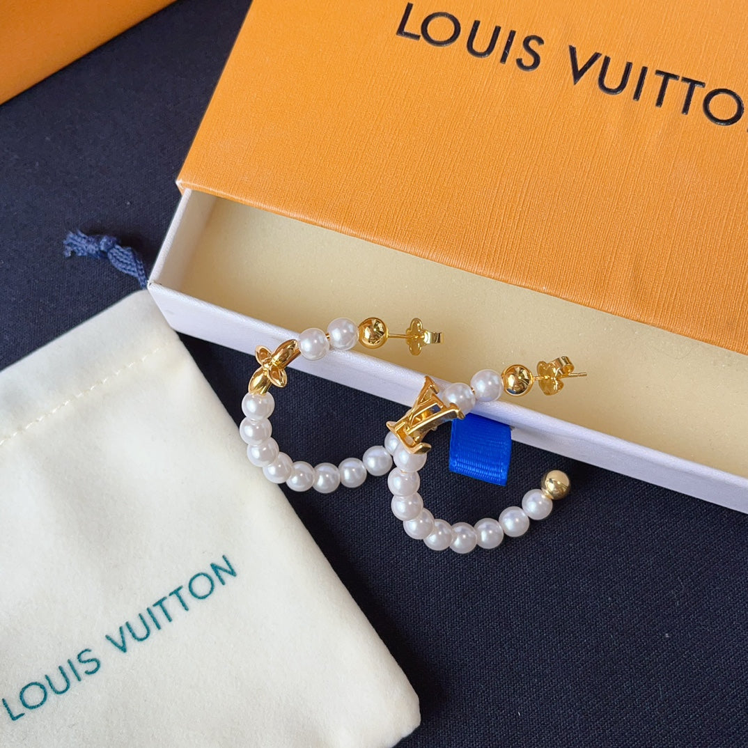 Boucles d'oreilles créoles fantaisie perles et fleurs