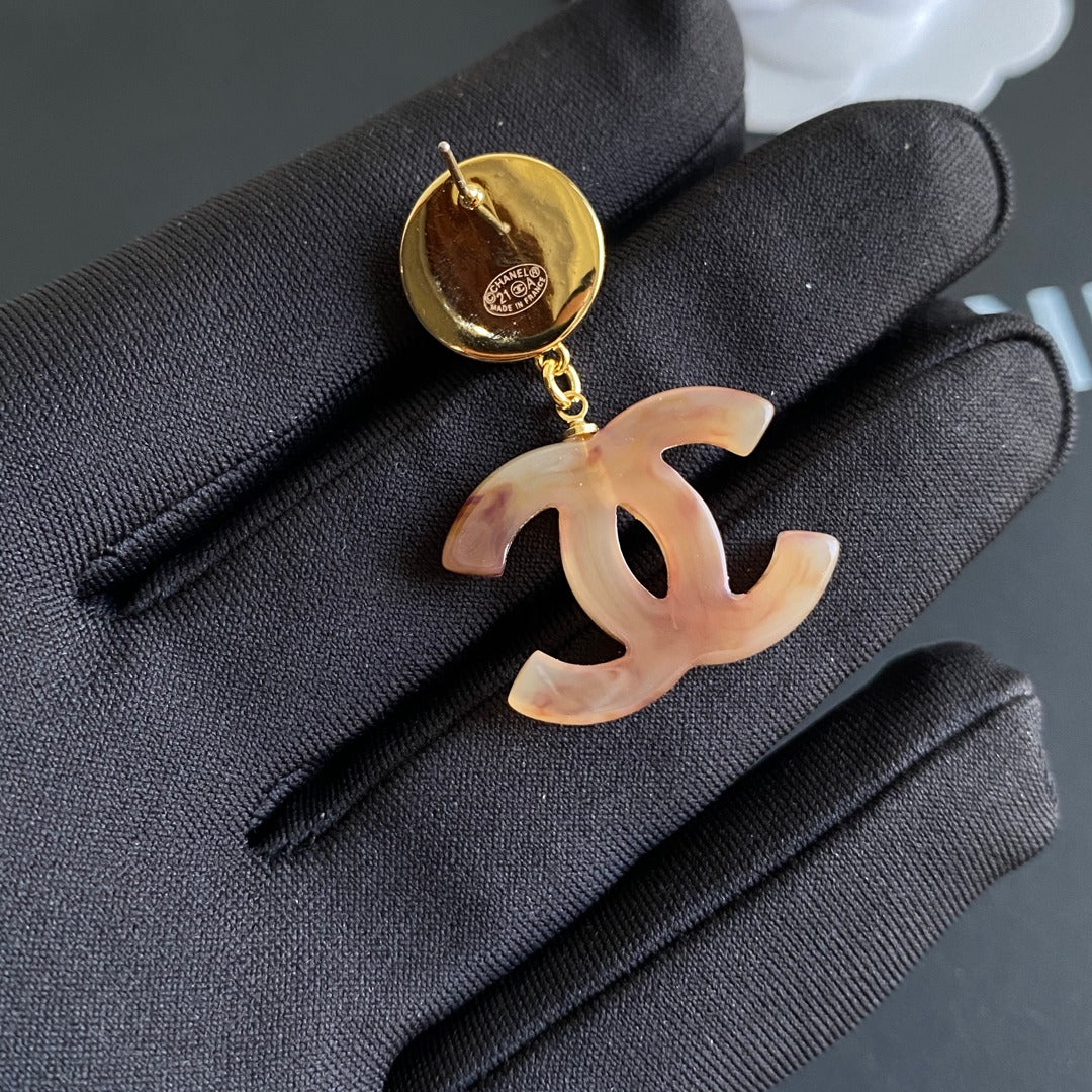 Pendientes con logo y colgante de ámbar vintage