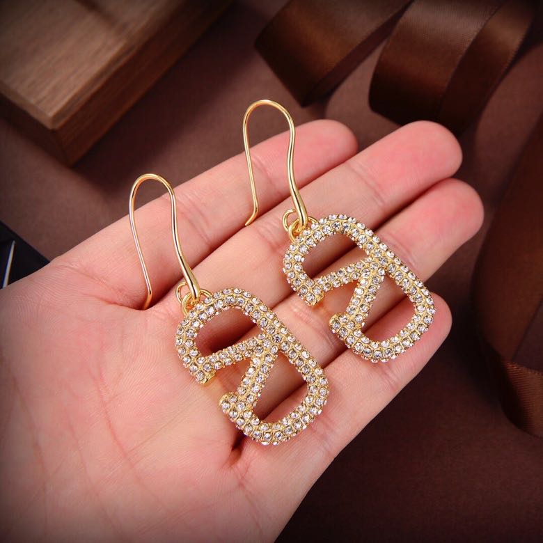 Pendientes metálicos Signature con logo totalmente de diamantes