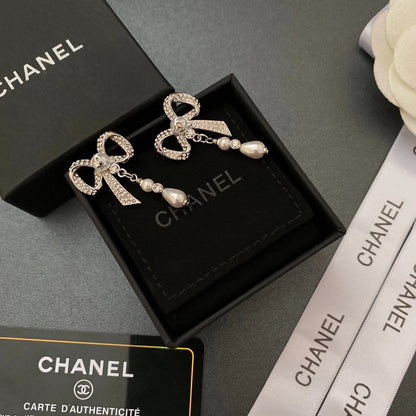 Boucles d'oreilles nœud en diamant de cristal de tempérament