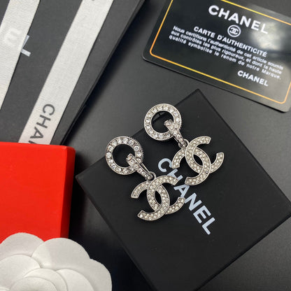 Pendientes de diamante con colgante de logo circular