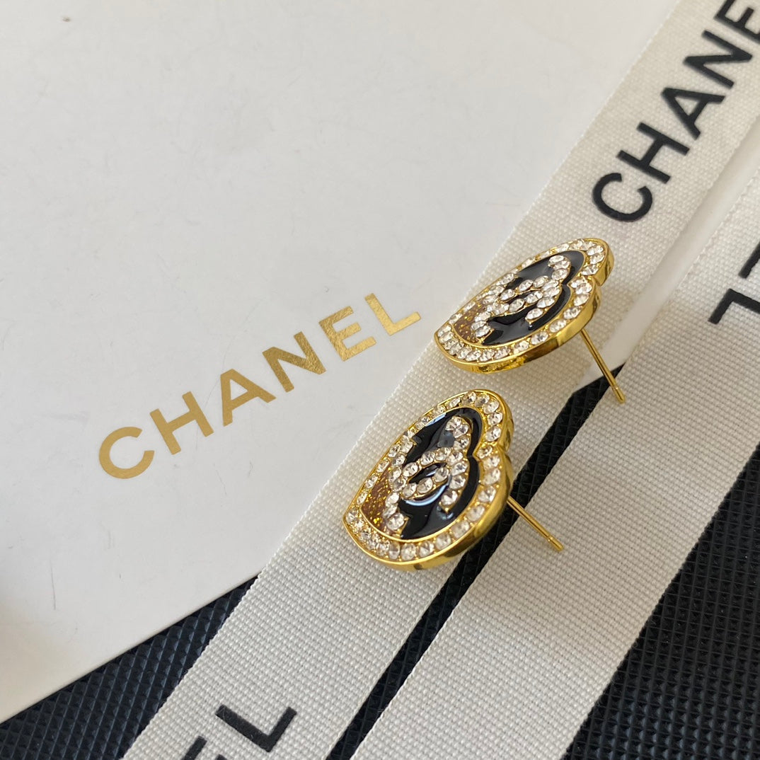Boucles d'oreilles clous cœur à paillettes
