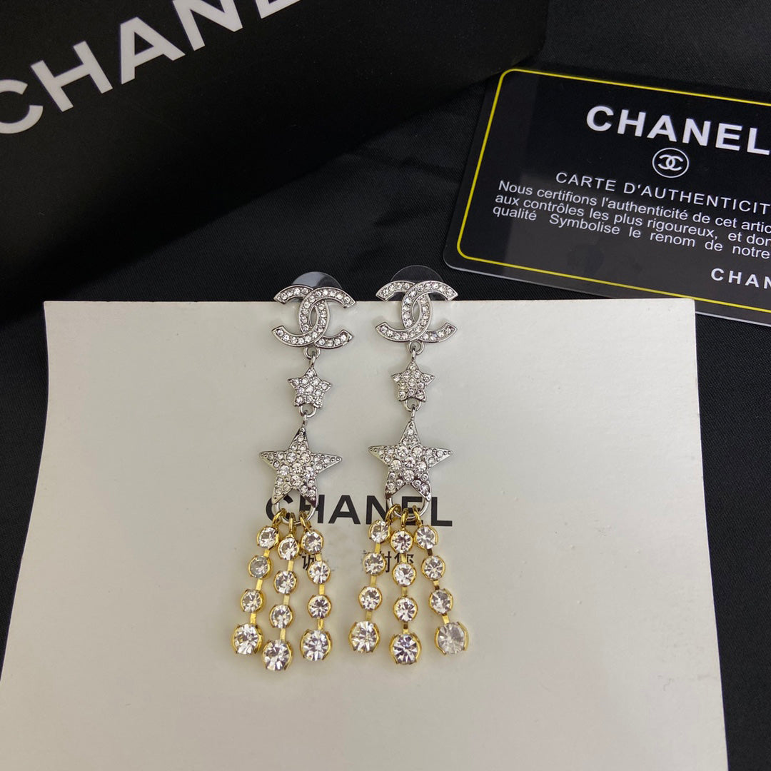 Boucles d'oreilles pendantes étoile en zircon étincelant