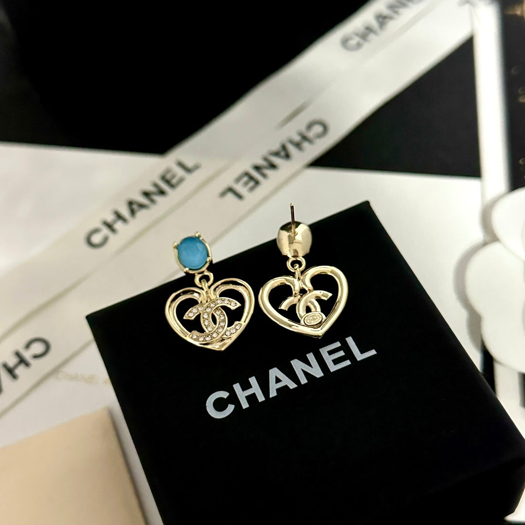 Pendientes vintage de corazón con gema azul
