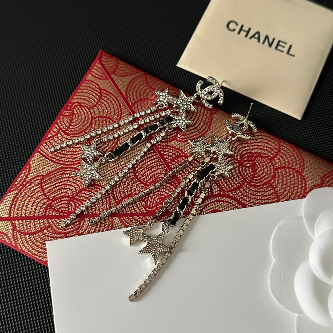 Pendientes largos con colgante de estrella de diamantes de imitación