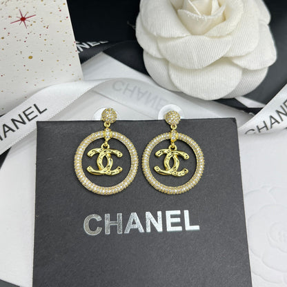 Pendientes de aro con colgante de diamante