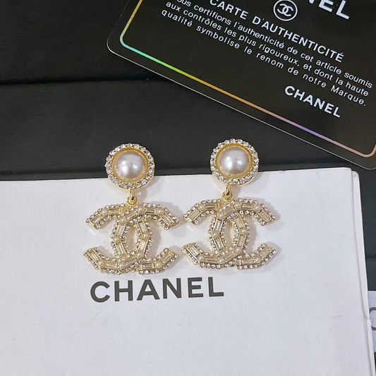 Boucles d'oreilles pendantes vintage diamant et perle