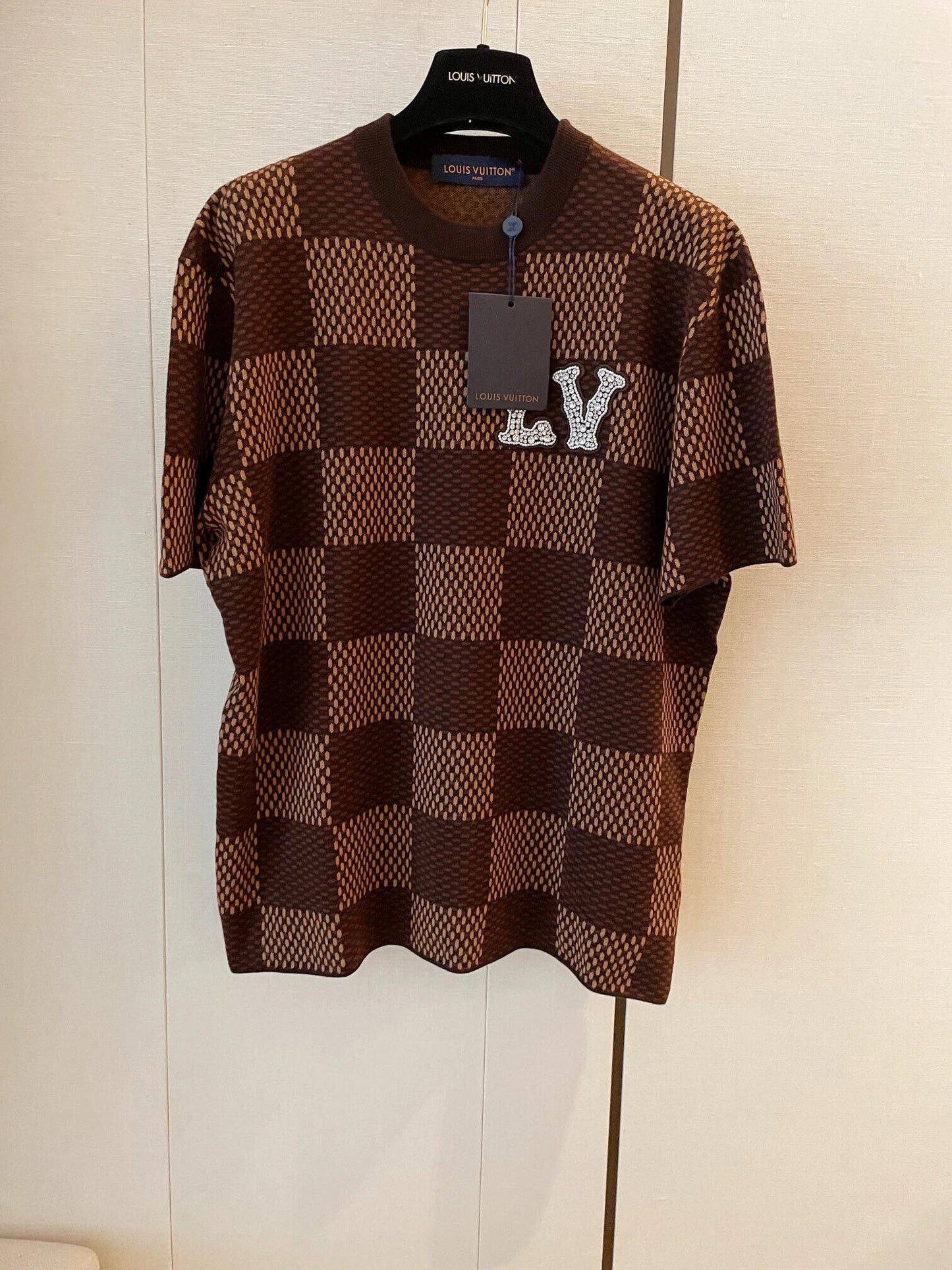 manches courtes à motif damier