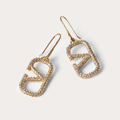 Pendientes metálicos Signature con logo totalmente de diamantes