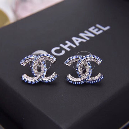 Boucles d'oreilles lettre diamant double rangée bleues