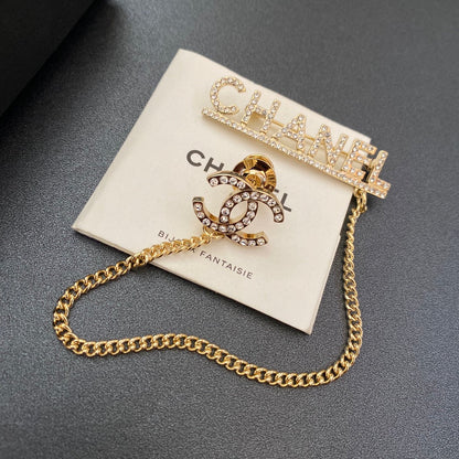 Broche à chaîne de boutons