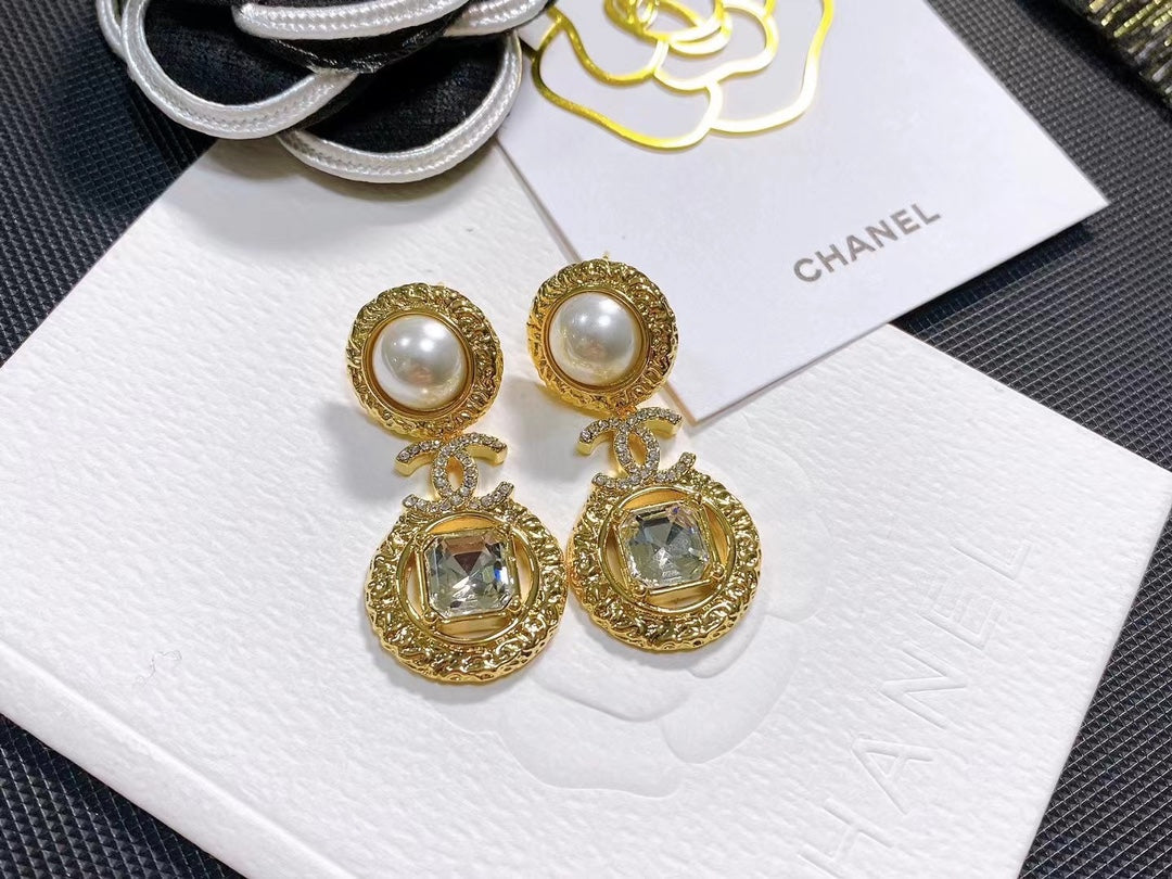 Boucles d'oreilles pendantes élégantes en cristal diamanté
