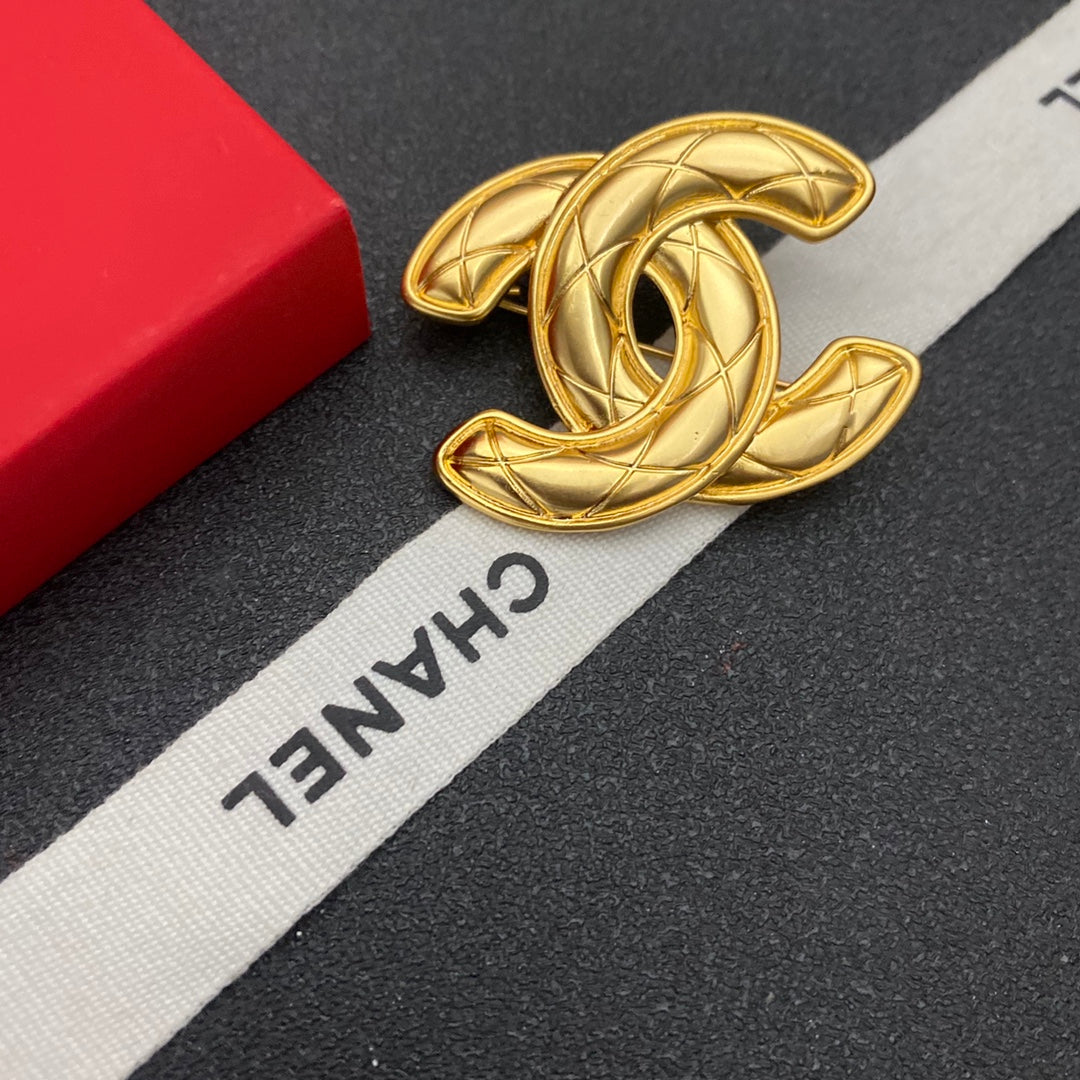 Broche à motif losange