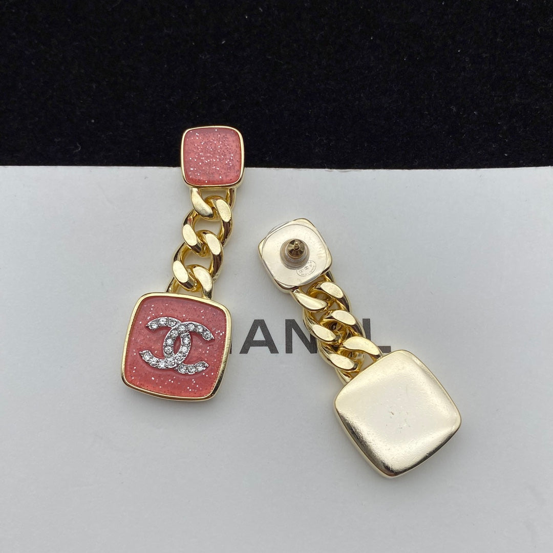 Boucles d'oreilles émaillées rose étincelant