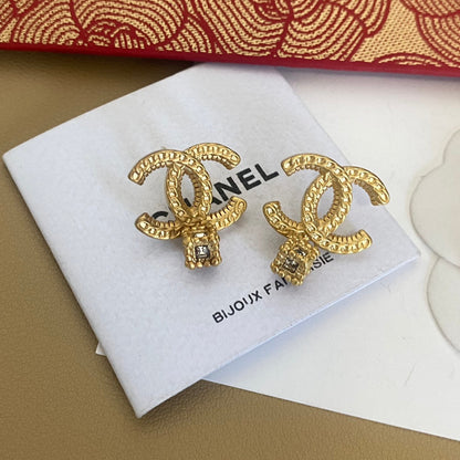 Boucles d'oreilles en bronze doré antique
