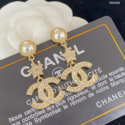Boucles d'oreilles lettre étoile en zircon étincelant