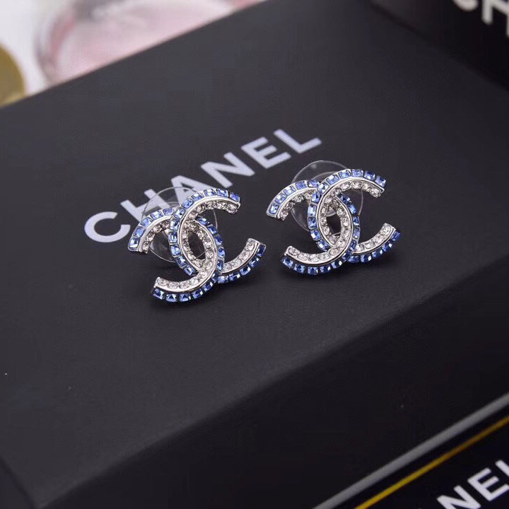 Boucles d'oreilles lettre diamant double rangée bleues