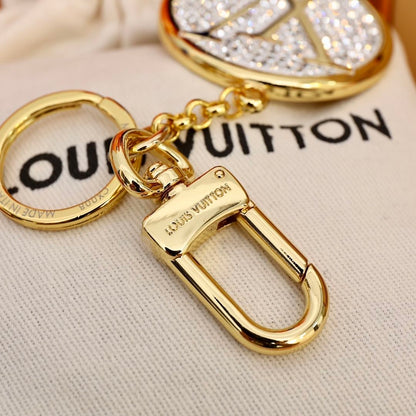 Porte-clés pendentif rond entièrement serti de diamants