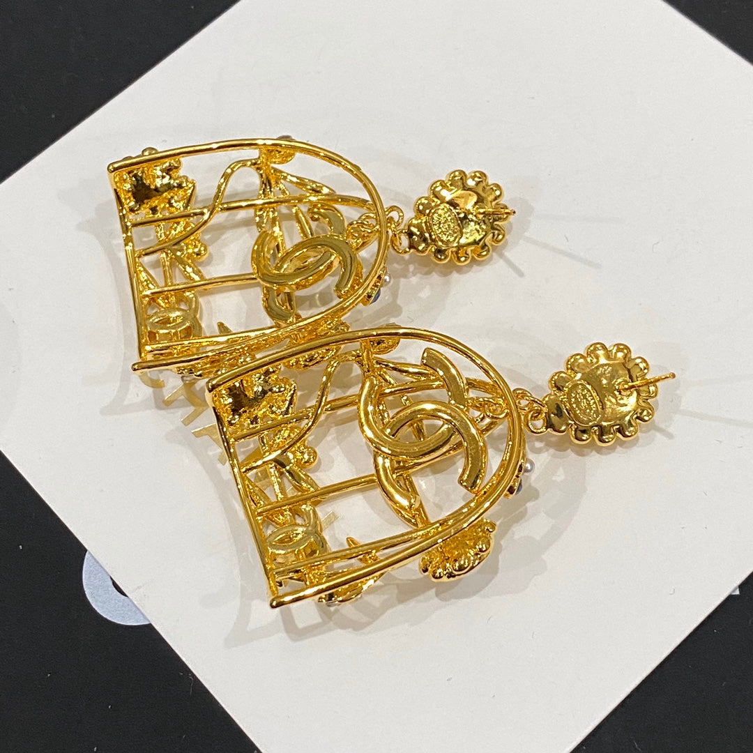 Boucles d'oreilles clous Retor Gold Cage à oiseaux