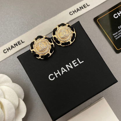 Boucles d'oreilles en cuir noir et doré