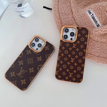 Étui en cuir monogrammé à cadre métallique