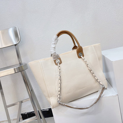 Bolso tote con cadena y bordado de perlas