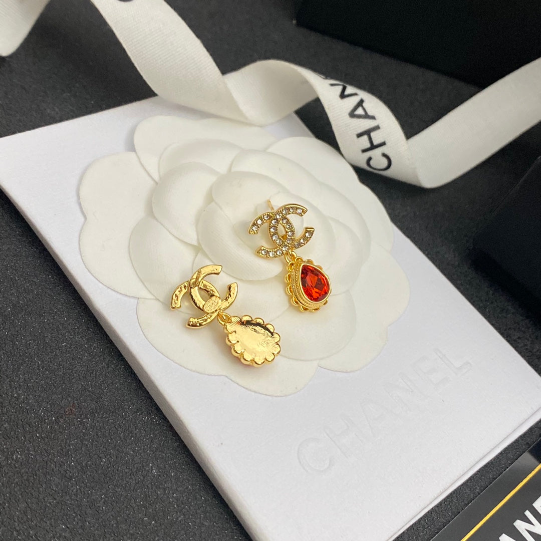 Boucles d'oreilles pendantes vintage avec gemmes rouges