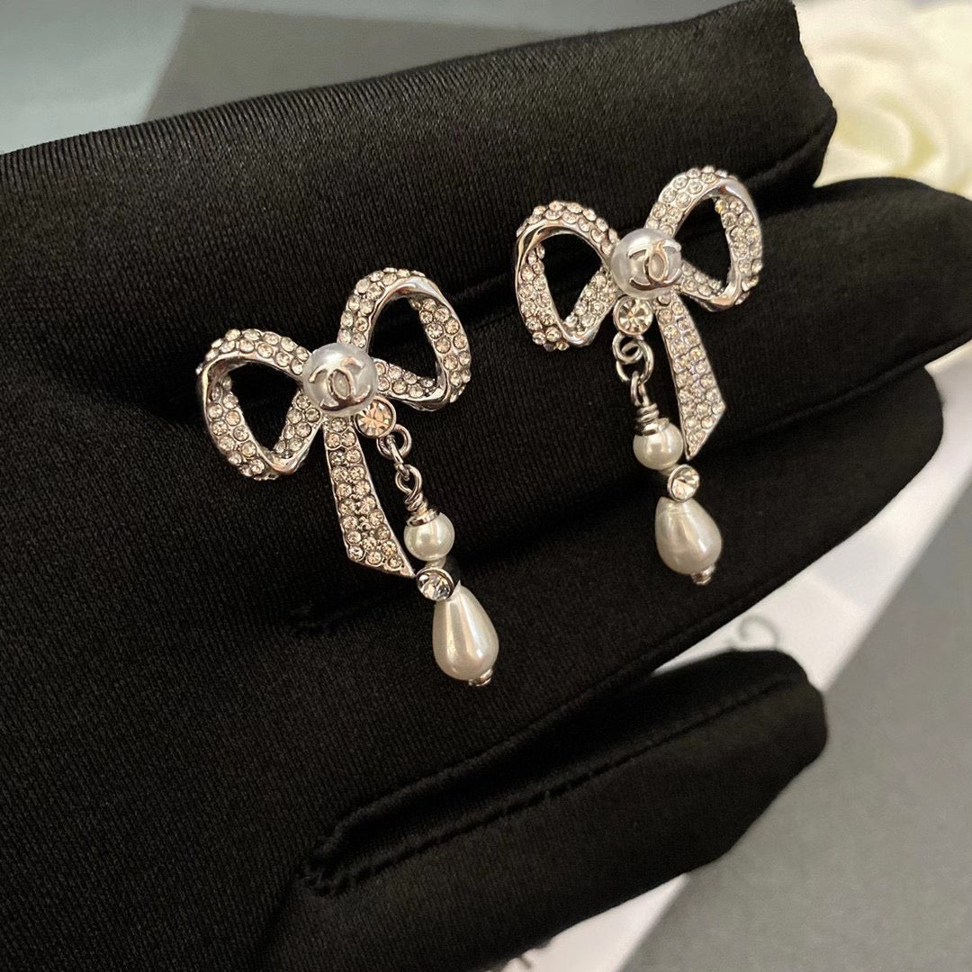 Boucles d'oreilles nœud en diamant de cristal de tempérament