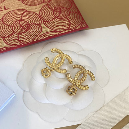 Boucles d'oreilles en bronze doré antique