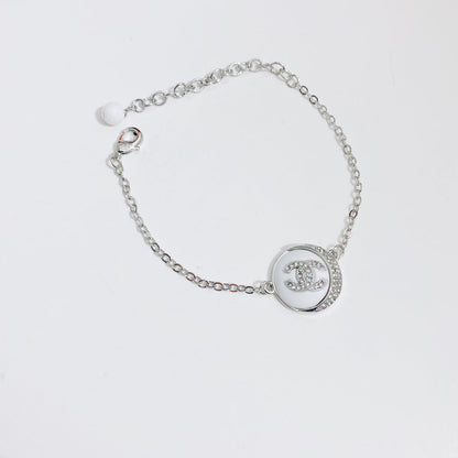 Pulsera con logotipo de diamante redondo