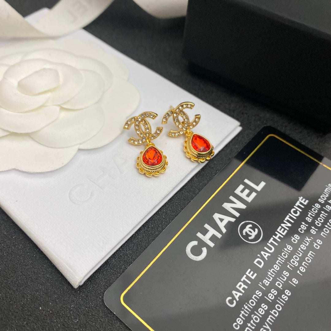 Boucles d'oreilles pendantes vintage avec gemmes rouges