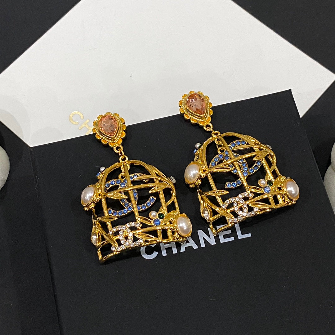 Boucles d'oreilles clous Retor Gold Cage à oiseaux