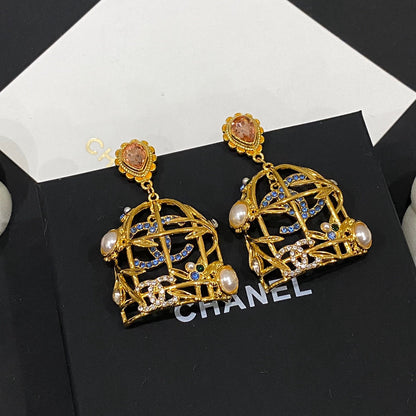 Boucles d'oreilles clous Retor Gold Cage à oiseaux