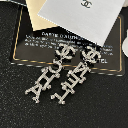 Pendientes colgantes con inicial de diamante