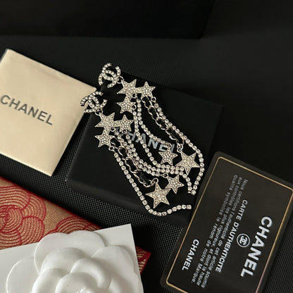 Pendientes largos con colgante de estrella de diamantes de imitación